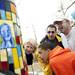 A group of neighbors inspect the public artwork mural in Allmendinger Park on Sunday. Daniel Brenner I AnnArbor.com